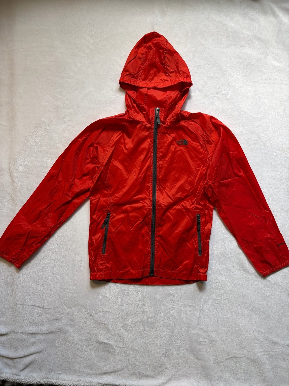 The North Face Kids’ Red Orange Hooded Windbreaker Jacket